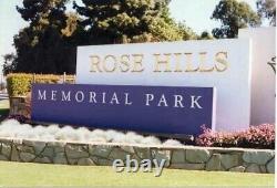 Two graves, side by side in Garden of Commemoration at Rose Hills Memorial Park